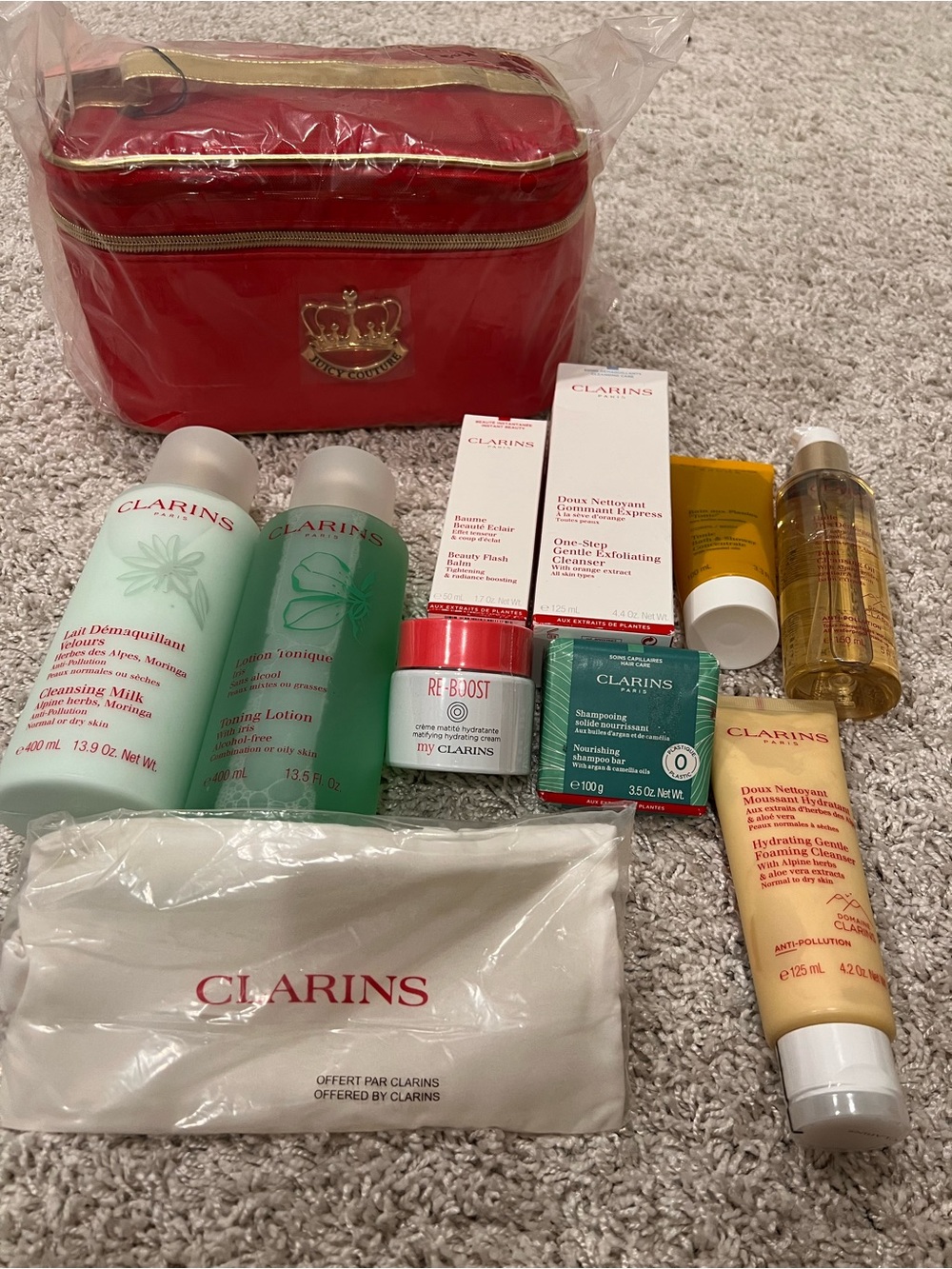 Clarins and juicy makeup bag bundle